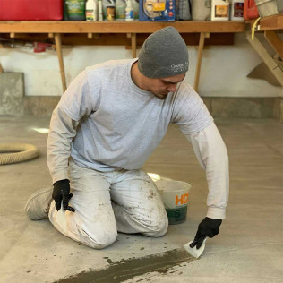 george apap employee coating floor
