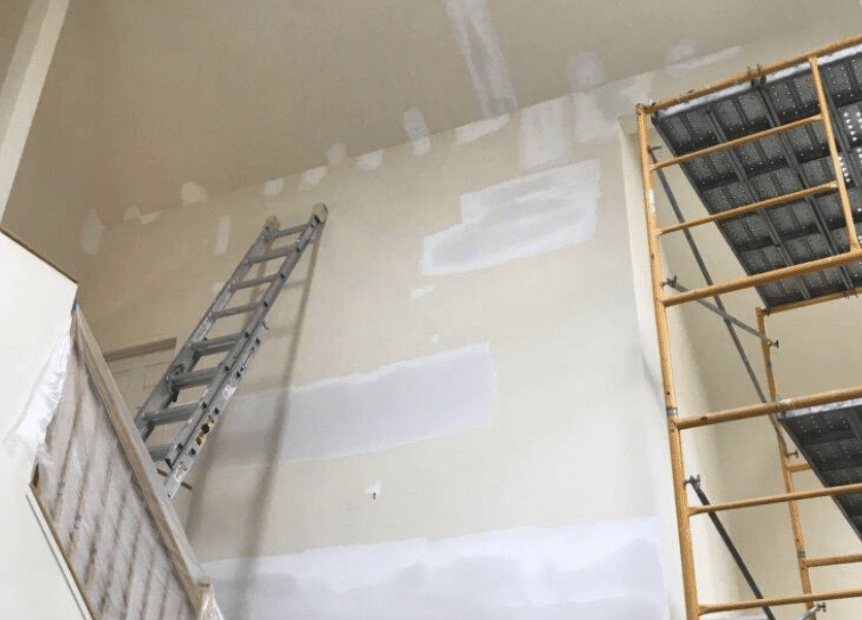 unfinished high ceiling paint job