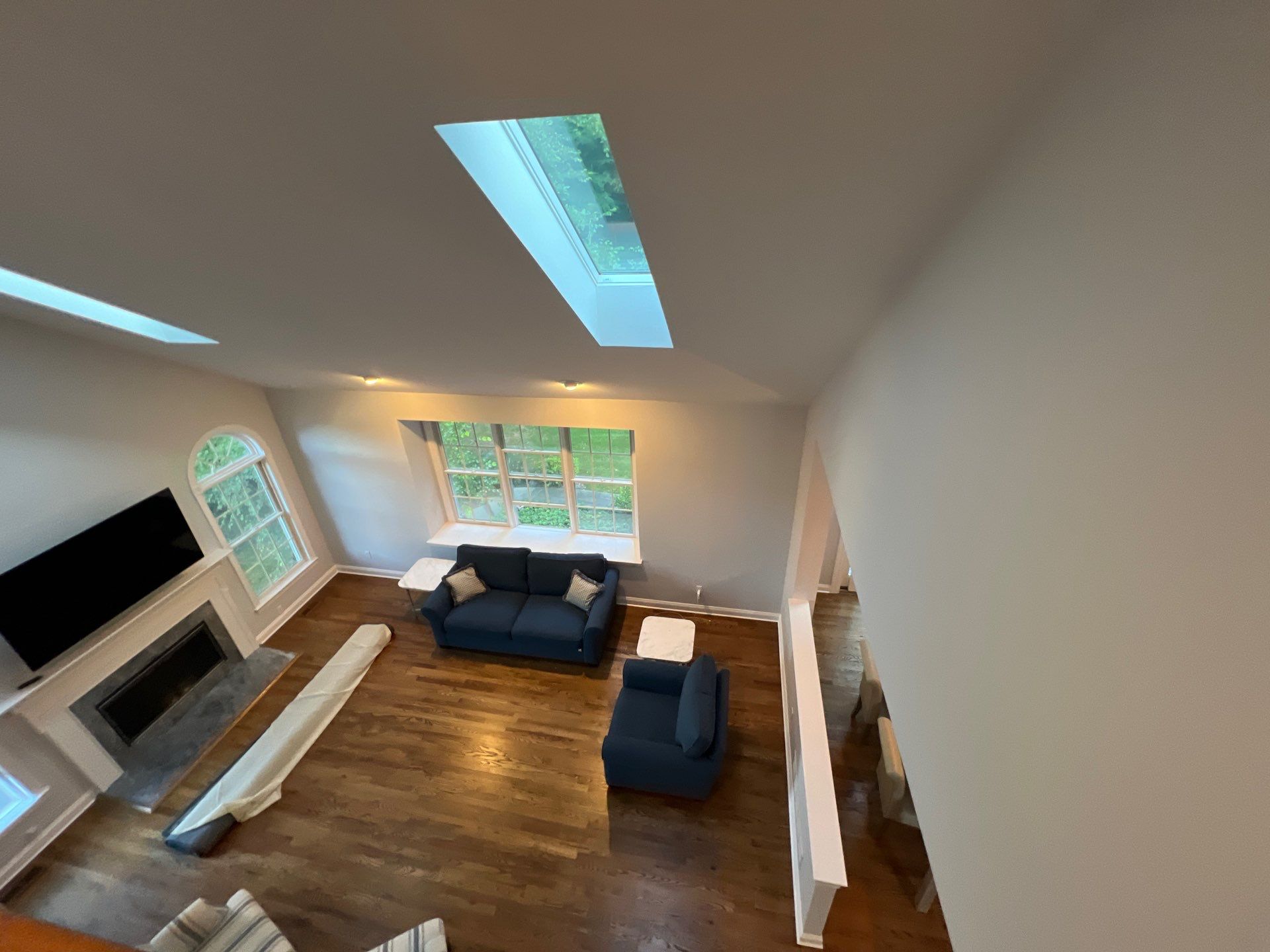 living room with high ceiling