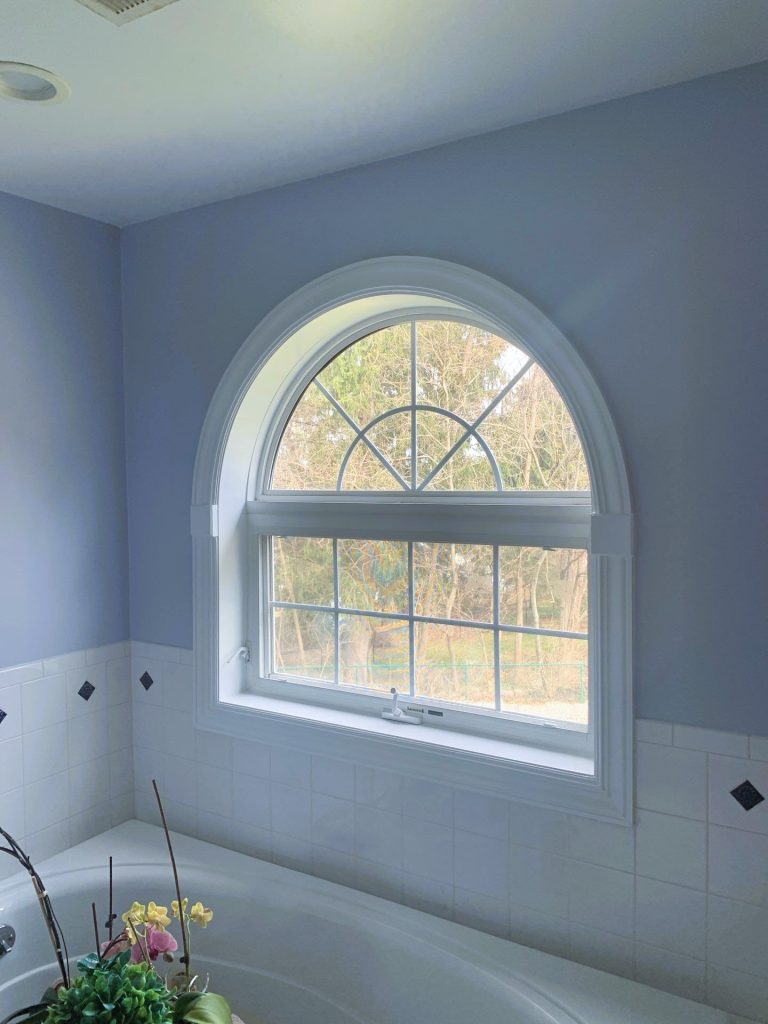 home bathroom window after interior painting on walls