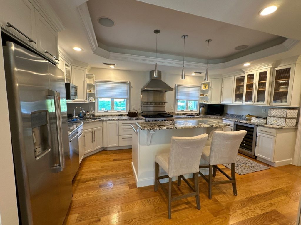 wide shot of newly painted kitchen and cabinets